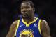 Golden State Warriors' Kevin Durant looks on during the second half of an NBA basketball game against the Philadelphia 76ers, Saturday, Nov. 18, 2017, in Philadelphia. The Warriors won 124-116. (AP Photo/Chris Szagola)