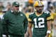 Green Bay Packers head coach Mike McCarthy talks to Aaron Rodgers before a preseason NFL football game against the Philadelphia Eagles Thursday, Aug. 10, 2017, in Green Bay, Wis. (AP Photo/Mike Roemer)