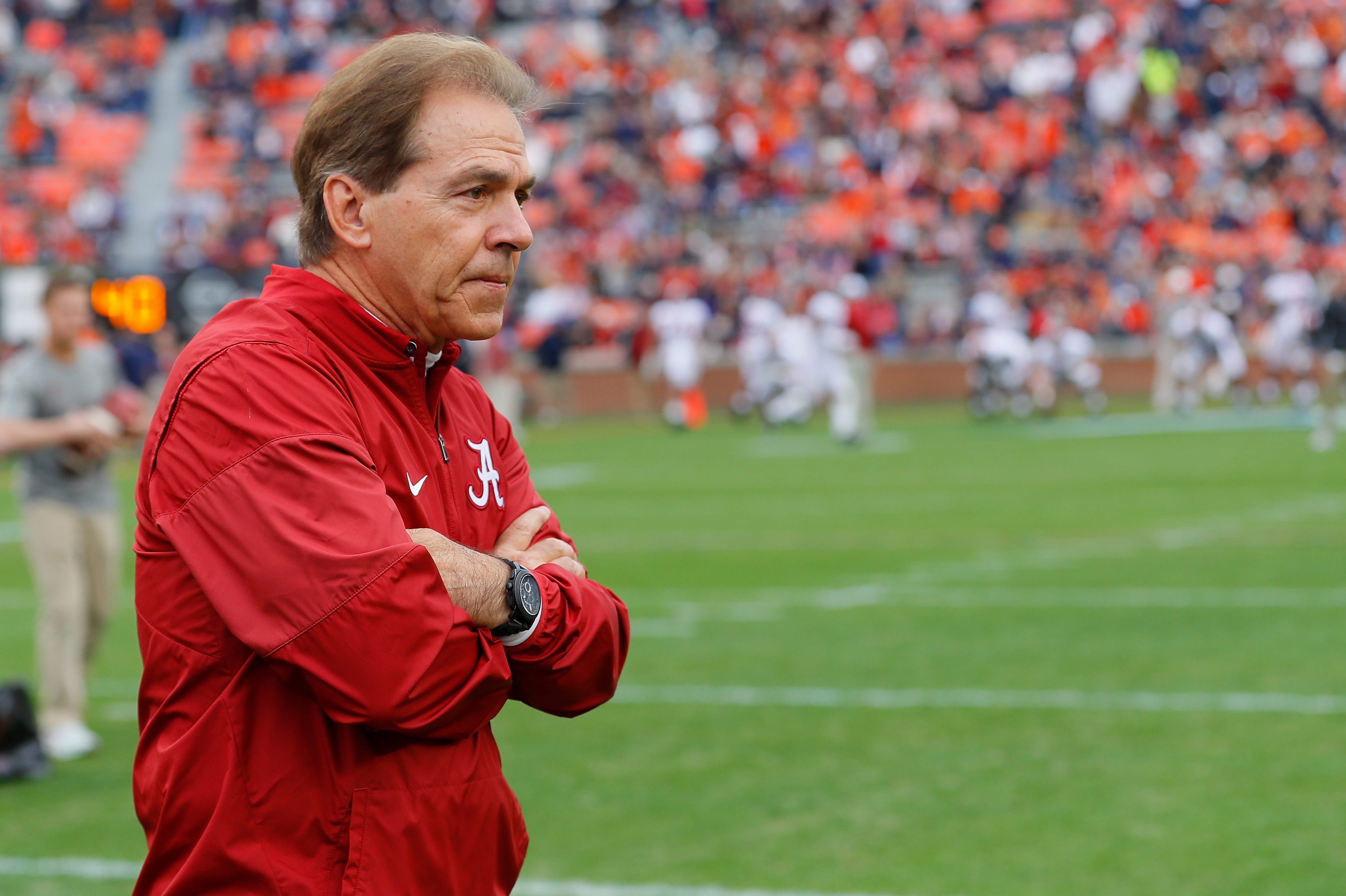 AUBURN, AL - NOVEMBER 25: Head coach Nick Saban of the Alabama Crimson Tide leads his team in warm ups prior to the game against the Auburn Tigers at Jordan Hare Stadium on November 25, 2017 in Auburn, Alabama. (Photo by Kevin C. Cox/Getty Images)