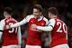 LONDON, ENGLAND - NOVEMBER 29: Mesut Ozil of Arsenal celebrates after scoring his sides fourth goal with Shkodran Mustafi of Arsenal during the Premier League match between Arsenal and Huddersfield Town at Emirates Stadium on November 29, 2017 in London, England. (Photo by Julian Finney/Getty Images)
