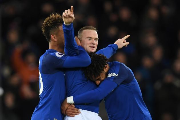 Everton's English striker Wayne Rooney (C) celebrates scoring his third goal to complete his hattrick during the English Premier League football match between Everton and West Ham United at Goodison Park in Liverpool, north west England on November 29, 2017. / AFP PHOTO / Paul ELLIS / RESTRICTED TO EDITORIAL USE. No use with unauthorized audio, video, data, fixture lists, club/league logos or 'live' services. Online in-match use limited to 75 images, no video emulation. No use in betting, games or single club/league/player publications.  /         (Photo credit should read PAUL ELLIS/AFP/Getty Images)