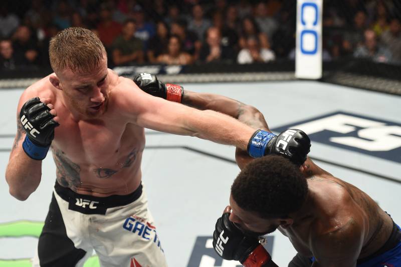 LAS VEGAS, NV - JULY 07: (L-R) Justin Gaethje punches Michael Johnson after their lightweight bout during The Ultimate Fighter Finale at T-Mobile Arena on July 7, 2017 in Las Vegas, Nevada. (Photo by Brandon Magnus/Zuffa LLC/Zuffa LLC via Getty Images)