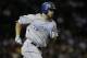 Kansas City Royals' Mike Moustakas rounds the bases after hitting a solo home run against the Chicago White Sox during the fourth inning of a baseball game Friday, Aug. 11, 2017, in Chicago. (AP Photo/Nam Y. Huh)