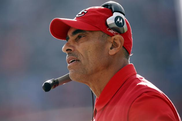 FILE - In this Dec. 7, 2008, file photo, Kansas City Chiefs coach Herm Edwards watches the team's NFL football game against the Denver Broncos in Denver. A person with direct knowledge of the plan has told The Associated Press that Edwards is in line to become Arizona State's next coach, pending approval of the university president. The official spoke to the AP on the condition of anonymity Wednesday night, Nov. 29, 2017, because the deal and official announcement are still being finalized. Edwards has not coached since 2008, when he was fired after a 2-14 season with the Chiefs. He also coached the New York Jets from 2001-05 and has spent the last nine years as an analyst for ESPN. (AP Photo/David Zalubowski, File)