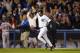 BRONX, NY - OCTOBER 16: Aaron Boone #19 of the New York Yankees celebrates after hitting the game winning home run in the bottom of the eleventh inning against the Boston Red Sox during game 7 of the American League Championship Series on October 16, 2003 at Yankee Stadium in the Bronx, New York. The Yankees won 6-5, advancing them to the World Series. (Photo by Ezra Shaw/Getty Images)