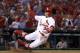 St. Louis Cardinals' Aledmys Diaz scores during the seventh inning of a baseball game against the Pittsburgh Pirates, Sunday, June 25, 2017, in St. Louis. (AP Photo/Jeff Roberson)