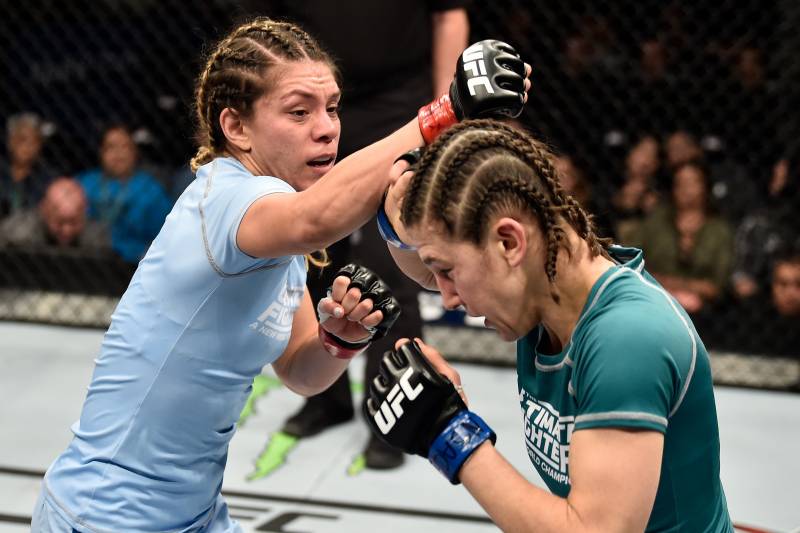 LAS VEGAS, NV - DECEMBER 01: (L-R) Nicco Montano punches Roxanne Modafferi in their women's flyweight championship bout during the TUF Finale event inside Park Theater on December 01, 2017 in Las Vegas, Nevada. (Photo by Jeff Bottari/Zuffa LLC/Zuffa LLC via Getty Images)