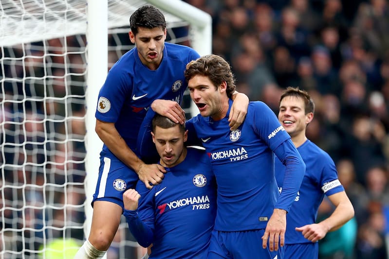 LONDON, ENGLAND - DECEMBER 02: Eden Hazard of Chelsea celebrates after scoring his sides third goal with Alvaro Morata of Chelsea and Marcos Alonso of Chelsea during the Premier League match between Chelsea and Newcastle United at Stamford Bridge on December 2, 2017 in London, England. (Photo by Clive Rose/Getty Images)