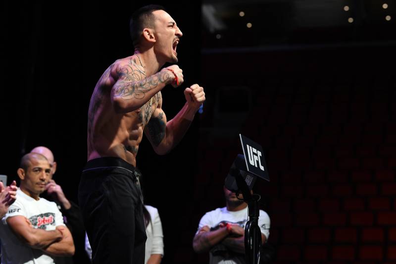 DETROIT, MI - DECEMBER 01: Max Holloway poses on the scale during the UFC 218 weigh-in inside Little Caesars Arena on December 1, 2017 in Detroit, Michigan. (Photo by Mike Roach/Zuffa LLC/Zuffa LLC via Getty Images)