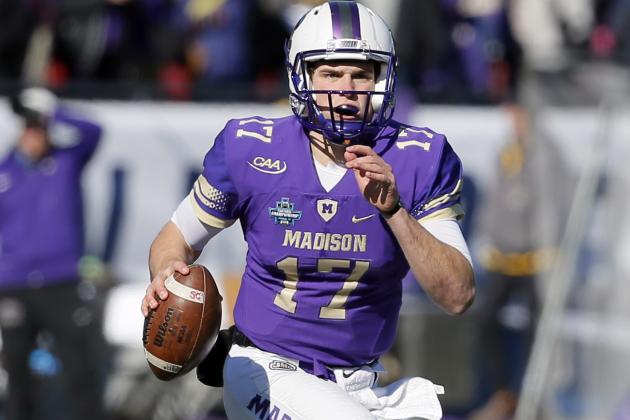 James Madison quarterback Bryan Schor (17) scrambles out of the pocket before throwing a pass in the first half of the FCS championship NCAA college football game against Youngstown State on Saturday, Jan. 7, 2017, in Frisco, Texas. (AP Photo/Tony Gutierrez)