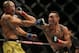 DETROIT, MI - DECEMBER 2: (R) Max Holloway punches Jose Aldo during the UFC 218 event at Little Caesars Arena on December 2, 2017 in Detroit, Michigan. (Photo by Rey Del Rio/Getty Images)