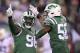 New York Jets defensive end Muhammad Wilkerson (96) and inside linebacker Darron Lee (58) celebrate after a play against the Buffalo Bills during the second half of an NFL football game, Thursday, Nov. 2, 2017, in East Rutherford, N.J. (AP Photo/Bill Kostroun)