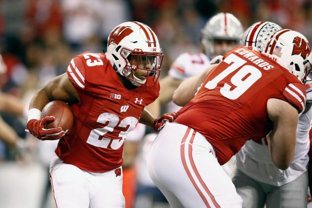 INDIANAPOLIS, IN - DECEMBER 02:  Running back Jonathan Taylor #23 of the Wisconsin Badgers runs the ball against the Ohio State Buckeyes during the Big Ten Championship game at Lucas Oil Stadium on December 2, 2017 in Indianapolis, Indiana.  (Photo by Andy Lyons/Getty Images)