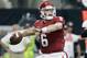 FILE - In this Dec. 2, 2017, file photo, Oklahoma quarterback Baker Mayfield (6) throws a pass in the first half of the Big 12 Conference championship NCAA college football game against TCU in Arlington, Texas. Mayfield, reigning Heisman winner Lamar Jackson of Louisville and Stanford running back Bryce Love were chosen as finalists for the Heisman Trophy on Monday, Dec. 4, 2017. (AP Photo/Tony Gutierrez, File)