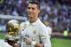 Real Madrid's Portuguese forward Cristiano Ronaldo poses with the Ballon d'Or France Football trophy before the Spanish league football match Real Madrid CF vs Granada FC at the Santiago Bernabeu stadium in Madrid on January 7, 2017. / AFP / GERARD JULIEN (Photo credit should read GERARD JULIEN/AFP/Getty Images)