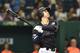 Japan's Shohei Ohtani follows a double in the seventh inning during the international friendly baseball match between Japan and the Netherlands at the Tokyo Dome on November 13, 2016. / AFP / KAZUHIRO NOGI (Photo credit should read KAZUHIRO NOGI/AFP/Getty Images)
