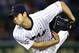 FILE - In this Nov. 19, 2015, file photo, Japan's starter Shohei Otani pitches against South Korea during the first inning of their semifinal game at the Premier12 world baseball tournament at Tokyo Dome in Tokyo. A person familiar with the decision says Major League Baseball owners on Friday, Dec. 1, 2017, have approved a new posting agreement with their Japanese counterparts in a move that allows bidding to start for coveted pitcher and outfielder Shohei Ohtani. The person spoke on condition of anonymity because no announcement had been made. (AP Photo/Shizuo Kambayashi, File)