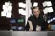 In this Nov. 16, 2017, photo, Brent Musburger looks at notes during a broadcast at the South Point hotel and casino in Las Vegas. During the show, part of the Vegas Stats & Information Network, Musburger and others talk about sports betting. (AP Photo/John Locher)