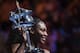 Serena Williams of the US celebrates with the championship trophy and the ballkids during the awards ceremony after her victory against Venus Williams of the US in the women's singles final on day 13 of the Australian Open tennis tournament in Melbourne on January 28, 2017. / AFP / WILLIAM WEST / IMAGE RESTRICTED TO EDITORIAL USE - STRICTLY NO COMMERCIAL USE (Photo credit should read WILLIAM WEST/AFP/Getty Images)