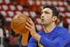 Golden State Warriors center Zaza Pachulia (27) shoots during warmups before the Warriors played against the Miami Heat in an NBA basketball game, Sunday, Dec. 3, 2017, in Miami. (AP Photo/Joe Skipper)