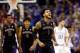KANSAS CITY, MO - DECEMBER 06: David Crisp #1 of the Washington Huskies celebrates during a timeout in the game against the Kansas Jayhawks at the Sprint Center on December 6, 2017 in Kansas City, Missouri. (Photo by Jamie Squire/Getty Images)