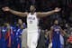 PHILADELPHIA, PA - DECEMBER 2: Joel Embiid #21 of the Philadelphia 76ers reacts in front of Andre Drummond #0 of the Detroit Pistons after a timeout in the fourth quarter at the Wells Fargo Center on December 2, 2017 in Philadelphia, Pennsylvania. The 76ers defeated the Pistons 108-103. NOTE TO USER: User expressly acknowledges and agrees that, by downloading and or using this photograph, User is consenting to the terms and conditions of the Getty Images License Agreement. (Photo by Mitchell Leff/Getty Images)