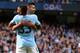 Manchester City's Brazilian striker Gabriel Jesus (L) celebrates with Manchester City's Argentinian striker Sergio Aguero after scoring their third goal during the English Premier League football match between Manchester City and Liverpool at the Etihad Stadium in Manchester, north west England, on September 9, 2017. / AFP PHOTO / Oli SCARFF / RESTRICTED TO EDITORIAL USE. No use with unauthorized audio, video, data, fixture lists, club/league logos or 'live' services. Online in-match use limited to 75 images, no video emulation. No use in betting, games or single club/league/player publications. / (Photo credit should read OLI SCARFF/AFP/Getty Images)