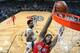 NEW ORLEANS, LA - DECEMBER 6: DeMarcus Cousins #0 of the New Orleans Pelicans dunks against the Denver Nuggets on December 6, 2017 at Smoothie King Center in New Orleans, Louisiana. NOTE TO USER: User expressly acknowledges and agrees that, by downloading and or using this Photograph, user is consenting to the terms and conditions of the Getty Images License Agreement. Mandatory Copyright Notice: Copyright 2017 NBAE (Photo by Layne Murdoch/NBAE via Getty Images)