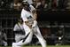 Chicago White Sox's Jose Abreu hits his 100th RBI of the season during the seventh inning of a baseball game against the Kansas City Royals Saturday, Sept. 23, 2017, in Chicago. (AP Photo/Jim Young)