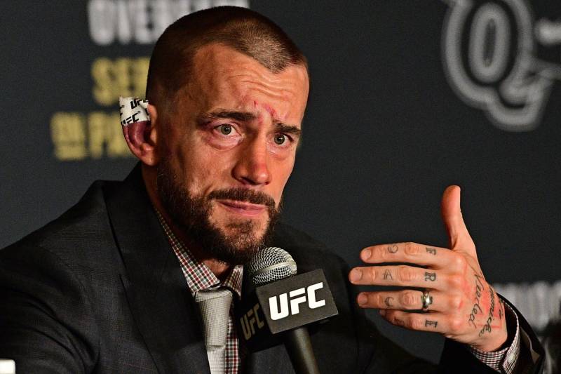 CM Punk speaks during the post fight press conference after his submission loss to Mickey Gall in a middleweight bout at UFC 203 on Saturday, Sept. 10, 2016, in Cleveland. (AP Photo/David Dermer)