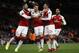 Arsenal's Mathieu Debuchy, second left, celebrates scoring his sides first goal during the Europa League Group H soccer match between Arsenal and BATE Borisov at Emirates stadium in London, Thursday, Dec. 7, 2017. (AP Photo/Kirsty Wigglesworth)