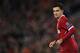 Liverpool's Brazilian midfielder Philippe Coutinho celebrates scoring their fifth goal and completing his hattrick during the UEFA Champions League Group E football match between Liverpool and Spartak Moscow at Anfield in Liverpool, north-west England on December 6, 2017. / AFP PHOTO / Paul ELLIS (Photo credit should read PAUL ELLIS/AFP/Getty Images)