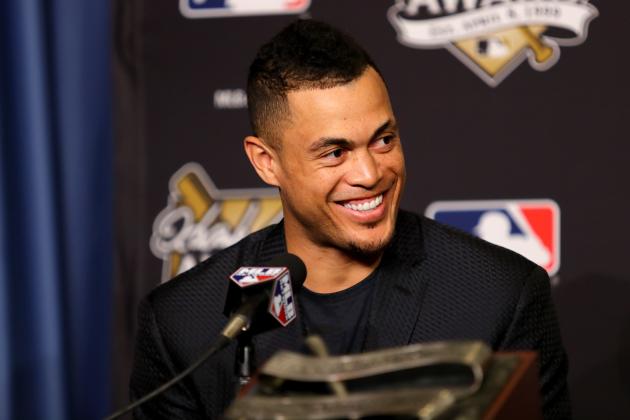 LOS ANGELES, CA - OCTOBER 25:  2017 Hank Aaron Award recipient Giancarlo Stanton #27 of the Miami Marlins attends the 2017 Hank Aaron Award press conference prior to game two of the 2017 World Series between the Houston Astros and the Los Angeles Dodgers at Dodger Stadium on October 25, 2017 in Los Angeles, California.  (Photo by Tim Bradbury/Getty Images)