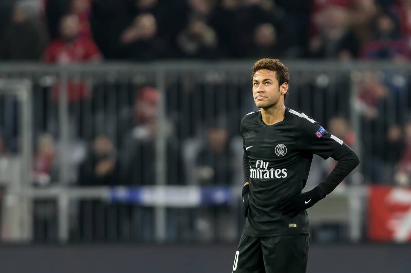 MUNICH, GERMANY - DECEMBER 05: Neymar of Paris Saint-Germain looks on during the UEFA Champions League group B match between Bayern Muenchen and Paris Saint-Germain at Allianz Arena on December 5, 2017 in Munich, Germany. (Photo by TF-Images/TF-Images via Getty Images)