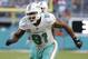 Miami Dolphins defensive end Cameron Wake (91) runs on the field, during the second half of an NFL football game against the Tampa Bay Buccaneers, Sunday, Nov. 19, 2017, in Miami Gardens, Fla. (AP Photo/Lynne Sladky)