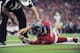 Houston Texans quarterback Tom Savage (3) is checked by a referee after he was hit during the first half of an NFL football game against the San Francisco 49ers, Sunday, Dec. 10, 2017, in Houston. Savage left the game. (AP Photo/Eric Christian Smith)