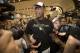 Former NBA basketball player Dennis Rodman arrives at Beijing Capital International Airport in Beijing, Saturday, June 17, 2017, after a flight from Pyongyang. Former NBA star Rodman, vowing to come back again soon, on Saturday wrapped up a low-key and incident-free visit to the North Korean capital. (AP Photo/Mark Schiefelbein)