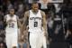 San Antonio Spurs forward Kawhi Leonard (2) and forward LaMarcus Aldridge (12) walk uproot during the second half of Game 5 in a second-round NBA basketball playoff series against the Houston Rockets, Tuesday, May 9, 2017, in San Antonio. (AP Photo/Eric Gay)