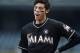 Miami Marlins' Christian Yelich reacts after a called third strike from Colorado Rockies starting pitcher Jon Gray in the first inning of a baseball game Wednesday, Sept. 27, 2017, in Denver. (AP Photo/David Zalubowski)