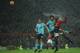 Manchester United's Belgian striker Romelu Lukaku (R) heads the ball past Bournemouth's Dutch defender Nathan Ake to score during the English Premier League football match between Manchester United and Bournemouth at Old Trafford in Manchester, north west England, on December 13, 2017. / AFP PHOTO / Oli SCARFF / RESTRICTED TO EDITORIAL USE. No use with unauthorized audio, video, data, fixture lists, club/league logos or 'live' services. Online in-match use limited to 75 images, no video emulation. No use in betting, games or single club/league/player publications. / (Photo credit should read OLI SCARFF/AFP/Getty Images)