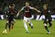 West Ham United's Austrian midfielder Marko Arnautovic (C) holds off Arsenal's Spanish defender Nacho Monreal (R) during the English Premier League football match between West Ham United and Arsenal at The London Stadium, in east London on December 13, 2017. / AFP PHOTO / Ian KINGTON / RESTRICTED TO EDITORIAL USE. No use with unauthorized audio, video, data, fixture lists, club/league logos or 'live' services. Online in-match use limited to 75 images, no video emulation. No use in betting, games or single club/league/player publications. / (Photo credit should read IAN KINGTON/AFP/Getty Images)