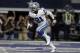 Dallas Cowboys' Ezekiel Elliott celebrates running the ball for a touchdown in the second half of an NFL football game against the Kansas City Chiefs on Sunday, Nov. 5, 2017, in Arlington, Texas. (AP Photo/Brandon Wade)