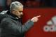 Manchester United's Portuguese manager Jose Mourinho points as he leaves the pitch after winning the English Premier League football match between Manchester United and Bournemouth at Old Trafford in Manchester, north west England, on December 13, 2017. / AFP PHOTO / Oli SCARFF / RESTRICTED TO EDITORIAL USE. No use with unauthorized audio, video, data, fixture lists, club/league logos or 'live' services. Online in-match use limited to 75 images, no video emulation. No use in betting, games or single club/league/player publications. / (Photo credit should read OLI SCARFF/AFP/Getty Images)