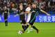 Real Madrid's French forward Karim Benzema (R) controls the ball during the FIFA Club World Cup semi-final match in the Emirati capital Abu Dhabi on December 13, 2017. / AFP PHOTO / GIUSEPPE CACACE (Photo credit should read GIUSEPPE CACACE/AFP/Getty Images)