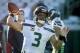 Seattle Seahawks quarterback Russell Wilson (3) warms up before the start an NFL football game against the Jacksonville Jaguars, Sunday, Dec. 10, 2017, in Jacksonville, Fla. (AP Photo/Stephen B. Morton)