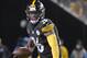 Pittsburgh Steelers running back Le'Veon Bell (26) plays in an NFL football game against the Baltimore Ravens, Sunday, Dec. 10, 2017, in Pittsburgh. (AP Photo/Don Wright)