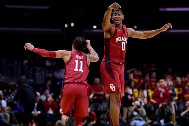 LOS ANGELES, CA - DECEMBER 08: Christian James #0 and Trae Young #11 of the Oklahoma Sooners react to a score in an 85-83 win over the USC Trojans during the Basketball Hall of Fame Classic at Staples Center on December 8, 2017 in Los Angeles, California. (Photo by Harry How/Getty Images)