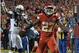 Kansas City Chiefs running back Kareem Hunt (27) celebrates his touchdown in front of Los Angeles Chargers safety Tre Boston (33) during the second half of an NFL football game in Kansas City, Mo., Saturday, Dec. 16, 2017. (AP Photo/Ed Zurga)
