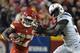 Kansas City Chiefs running back Kareem Hunt (27) runs away from Los Angeles Chargers linebacker Melvin Ingram (54) during the second half of an NFL football game in Kansas City, Mo., Saturday, Dec. 16, 2017. (AP Photo/Ed Zurga)