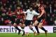 Liverpool's Egyptian midfielder Mohamed Salah (C) vies with Bournemouth's Dutch defender Nathan Ake (L) and Bournemouth's English defender Simon Francis (R) during the English Premier League football match between Bournemouth and Liverpool at the Vitality Stadium in Bournemouth, southern England on December 17, 2017. / AFP PHOTO / Glyn KIRK / RESTRICTED TO EDITORIAL USE. No use with unauthorized audio, video, data, fixture lists, club/league logos or 'live' services. Online in-match use limited to 75 images, no video emulation. No use in betting, games or single club/league/player publications. / (Photo credit should read GLYN KIRK/AFP/Getty Images)